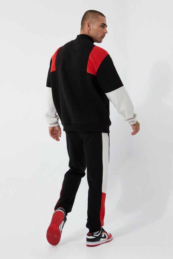 Are you ready to redefine your style with a touch of luxury and personalization? Look no further than our custom Colour Block Half-Zip Tracksuit for men. As a trusted custom tracksuit manufacturer, we specialize in offering personalized cotton fleece tracksuits and high-quality street clothing tailored to the discerning tastes of men. Explore this versatile set and elevate your fashion game effortlessly. Key Features: Custom Tailoring: Our custom tracksuits are meticulously designed to match your unique style. Choose your preferred color combinations, branding, logos, and more to create a tracksuit that is truly one-of-a-kind. Premium Cotton Fleece: Crafted with high-quality cotton fleece material, our tracksuits provide a luxurious feel, exceptional durability, and superior warmth, ensuring comfort and style go hand in hand. Half-Zip Design: The inclusion of a half-zip sweatshirt in this tracksuit set adds a touch of modernity and versatility, making it suitable for a wide range of occasions. Specifications: Material: Cotton Fleece Customization Options: Color combinations, branding, logos, and more Minimum Order Quantity: Contact us for details Lead Time: Tailored to your specific requirements Price: Request a personalized quote Quality Assurance: Our commitment to quality is unwavering. Each custom Colour Block Half-Zip Tracksuit for men undergoes rigorous quality control to meet the highest standards of craftsmanship, comfort, and style. Your satisfaction is our top priority. Wholesale Inquiry and Ordering Information: Ready to make a fashion statement with personalized comfort and style? Contact us today for wholesale inquiries, ordering details, and to explore our range of custom Colour Block Half-Zip Tracksuits for men and other high-quality street clothing.